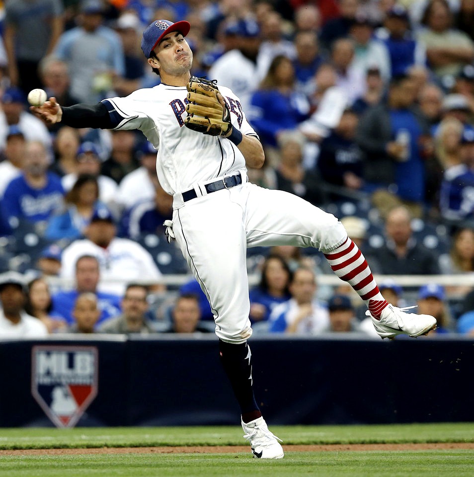 Chase d'Arnaud makes an infield throw for the San Diego Padres.