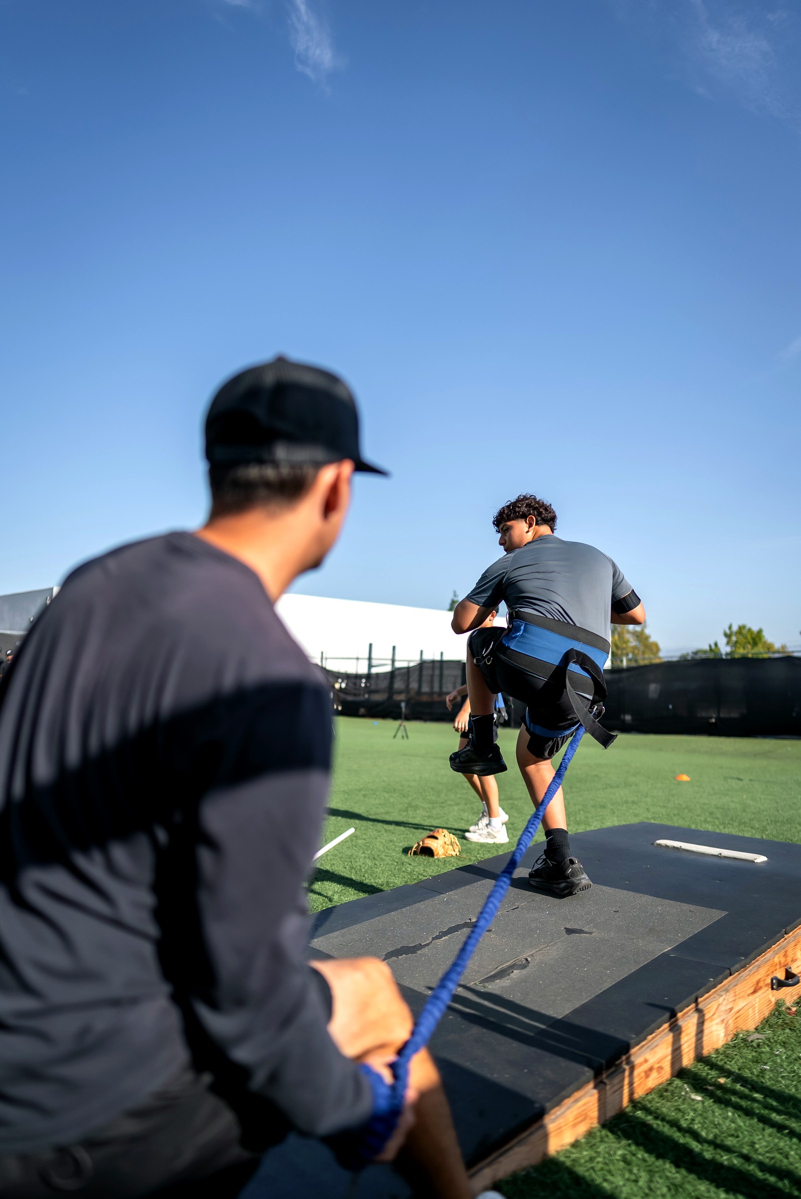 A coach working with an athlete at Futures Training Center.