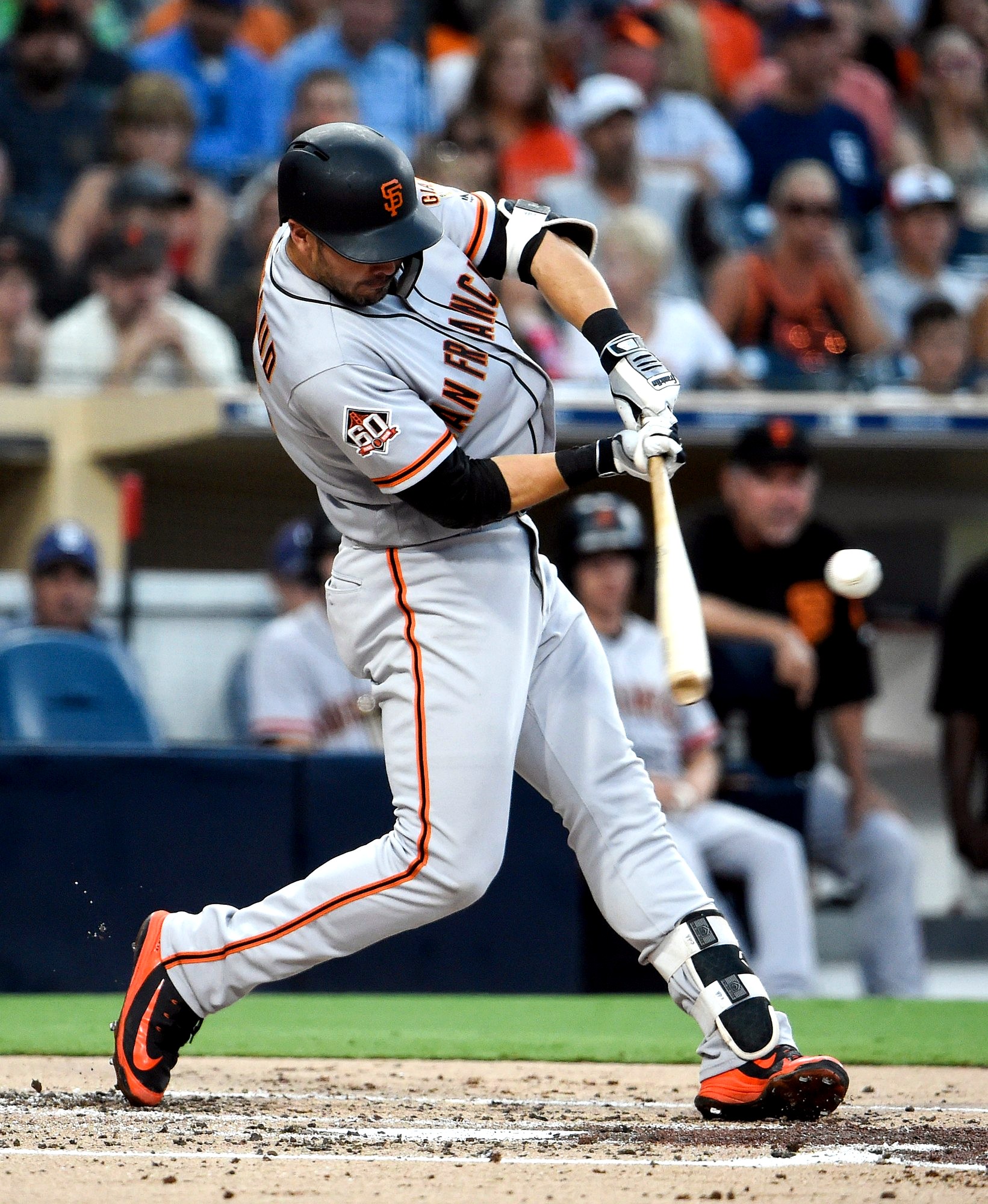 Chase d'Arnaud swings at a pitch for the San Francisco Giants.