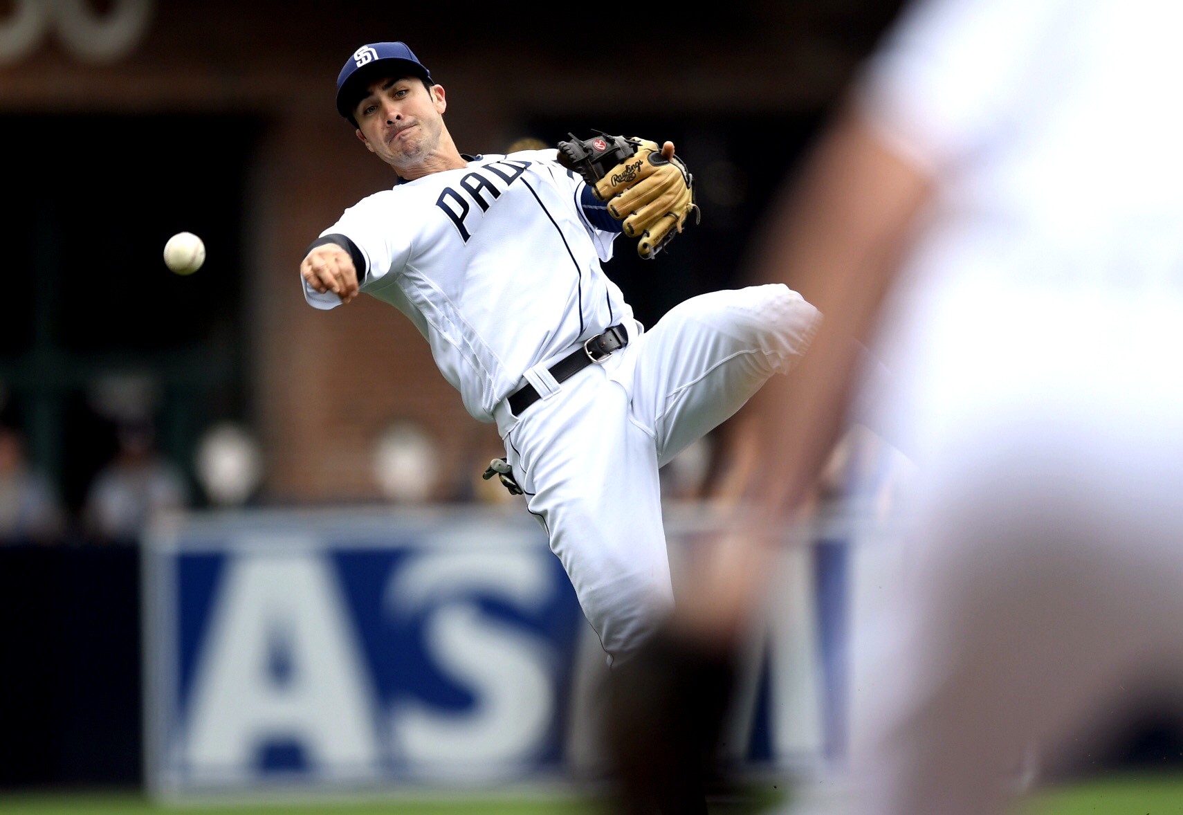Chase d'Arnaud makes an infield throw for the San Diego Padres.